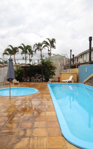 Casa de condomínio à venda com 80m², 3 quartos e 2 vagasÁrea comum - Piscina