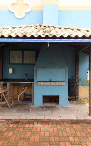 Casa de condomínio à venda com 80m², 3 quartos e 2 vagasÁrea comum - Churrasqueira