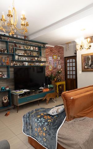 Casa à venda com 110m², 3 quartos e 2 vagas Casa à venda com 110m², 3 quartos e 2 vagasSala