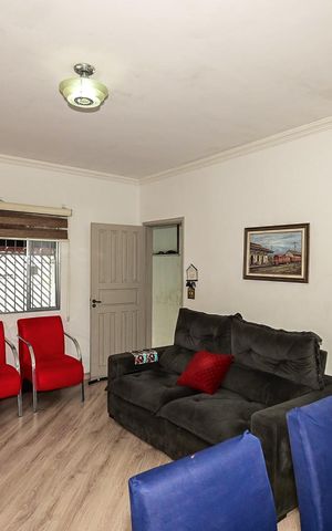 Casa à venda com 79m², 2 quartos e 2 vagasSala