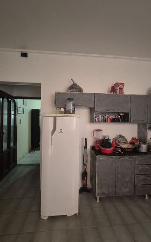 Casa à venda com 159m², 3 quartos e 2 vagas Casa à venda com 159m², 3 quartos e 2 vagasCozinha