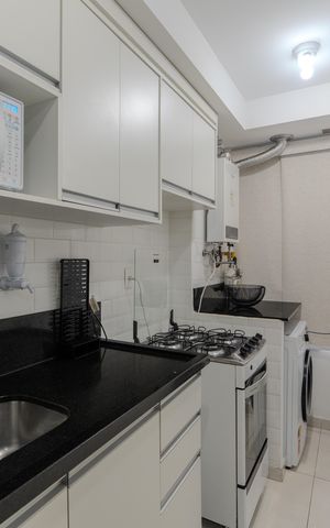 Apartamento à venda com 49m², 1 quarto e 1 vaga Apartamento à venda com 49m², 1 quarto e 1 vagaCozinha e Área de Serviço