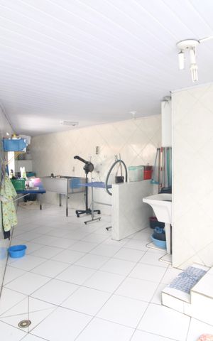 Casa à venda com 115m², 3 quartos e 3 vagasFundos da casa / lavanderia