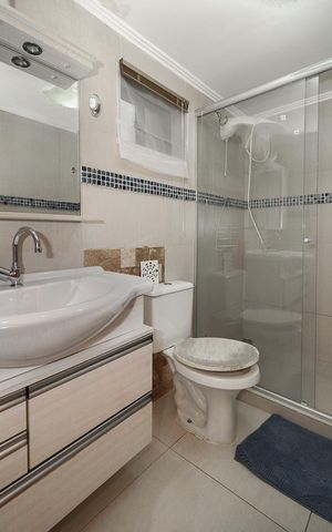 Casa à venda com 116m², 2 quartos e 2 vagasBanheiro da Suíte 2