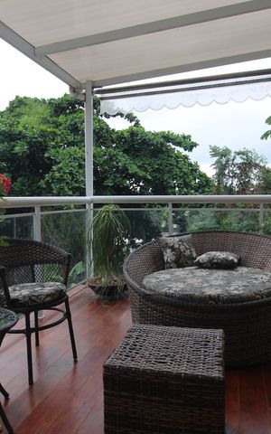 Casa de condomínio para alugar com 200m², 3 quartos e 2 vagasSala - Varanda