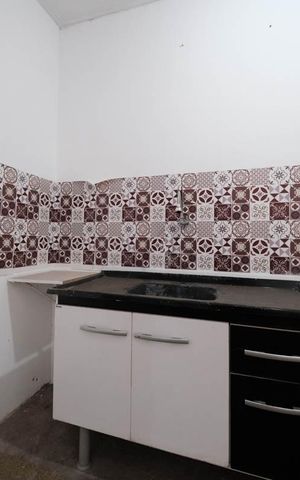 Casa à venda com 80m², 1 quarto e sem vagaCozinha e Área de Serviço