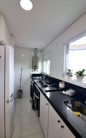Apartamento à venda com 61m², 1 quarto e 2 vagasCozinha e Área de Serviço