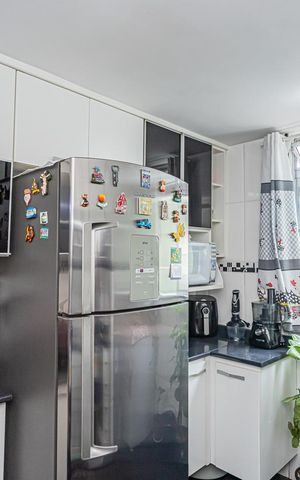 Apartamento à venda com 49m², 2 quartos e 1 vaga Apartamento à venda com 49m², 2 quartos e 1 vagaCozinha e Área de Serviço