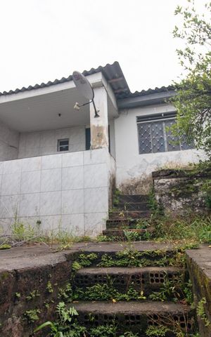 Casa à venda com 120m², 1 quarto e 2 vagasFachada Casa 1