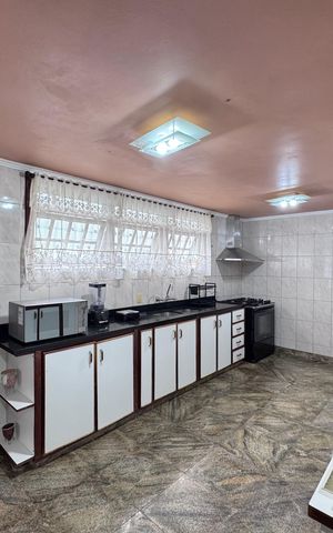 Casa de condomínio à venda com 562m², 4 quartos e 4 vagas Casa de condomínio à venda com 562m², 4 quartos e 4 vagasCozinha