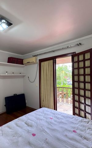 Casa de condomínio à venda com 562m², 4 quartos e 4 vagas Casa de condomínio à venda com 562m², 4 quartos e 4 vagasQuarto