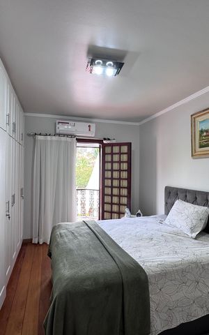 Casa de condomínio à venda com 562m², 4 quartos e 4 vagas Casa de condomínio à venda com 562m², 4 quartos e 4 vagasSuíte 1