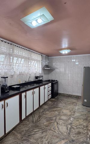 Casa de condomínio à venda com 562m², 4 quartos e 4 vagas Casa de condomínio à venda com 562m², 4 quartos e 4 vagasCozinha