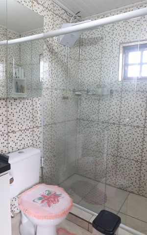 Casa à venda com 292m², 4 quartos e 2 vagasBanheiro da Suíte