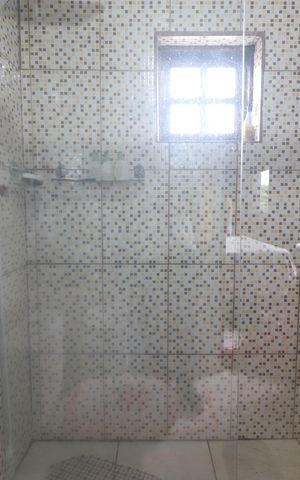 Casa à venda com 292m², 4 quartos e 2 vagasBanheiro da Suíte