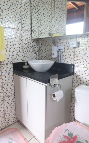 Casa à venda com 292m², 4 quartos e 2 vagasBanheiro da Suíte