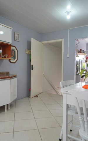Casa à venda com 140m², 2 quartos e 2 vagasCozinha