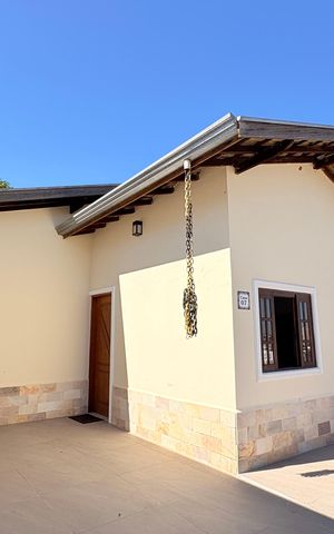 Casa de condomínio à venda com 84m², 3 quartos e 2 vagasFachada