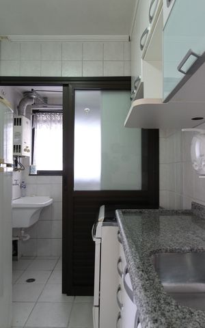Apartamento à venda com 55m², 2 quartos e 2 vagasCozinha e Área de Serviço