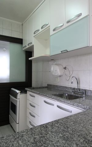 Apartamento à venda com 55m², 2 quartos e 2 vagasCozinha e Área de Serviço