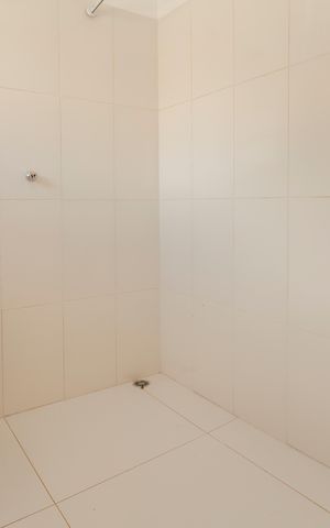 Casa à venda com 300m², 4 quartos e 2 vagasBanheiro da Suíte 2