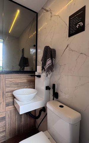 Casa à venda com 383m², 4 quartos e 2 vagas Casa à venda com 383m², 4 quartos e 2 vagasÁrea externa - lavabo