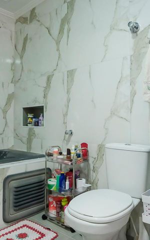 Casa à venda com 210m², 4 quartos e 2 vagasBanheiro