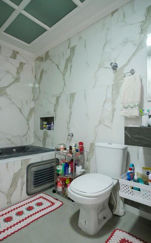 Casa à venda com 210m², 4 quartos e 2 vagasBanheiro