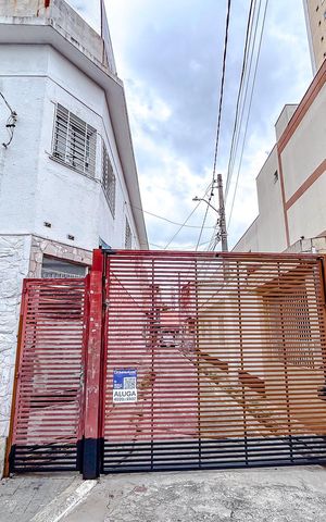 Casa para alugar com 100m², 2 quartos e 1 vagaFachada com Plaquinha