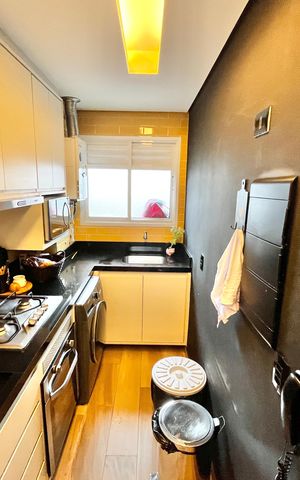 Apartamento à venda com 74m², 2 quartos e 1 vaga Apartamento à venda com 74m², 2 quartos e 1 vagaCozinha e Área de Serviço
