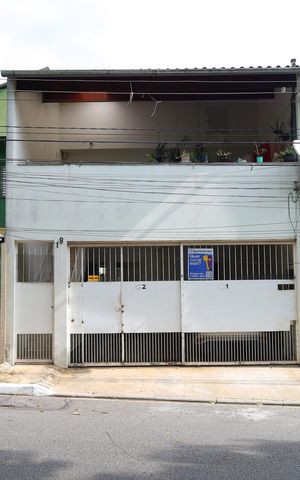 Casa para alugar com 60m², 2 quartos e 1 vagaFachada do imóvel - Placa instalada no portão do imóvel - Código da placa:YZUS-1623