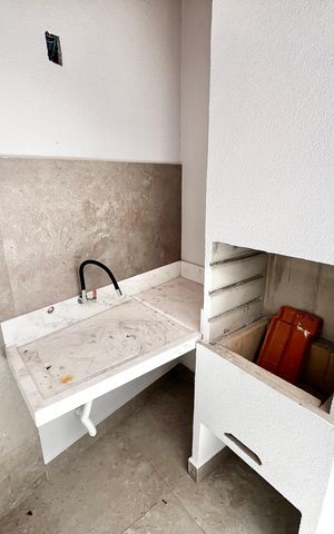 Casa à venda com 70m², 2 quartos e 2 vagas Casa à venda com 70m², 2 quartos e 2 vagasÁrea comum - Churrasqueira/Quintal