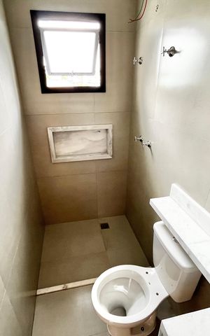 Casa à venda com 70m², 2 quartos e 2 vagas Casa à venda com 70m², 2 quartos e 2 vagasBanheiro da Suíte 2