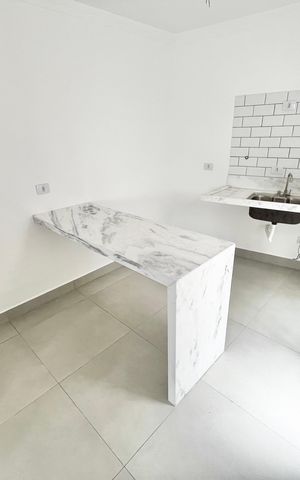 Casa à venda com 70m², 2 quartos e 2 vagas Casa à venda com 70m², 2 quartos e 2 vagasCozinha