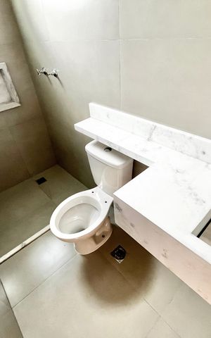 Casa à venda com 70m², 2 quartos e 2 vagas Casa à venda com 70m², 2 quartos e 2 vagasBanheiro da Suíte 2