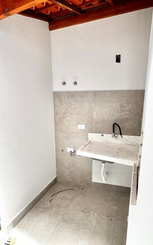 Casa à venda com 70m², 2 quartos e 2 vagas Casa à venda com 70m², 2 quartos e 2 vagasÁrea comum - Churrasqueira/Quintal