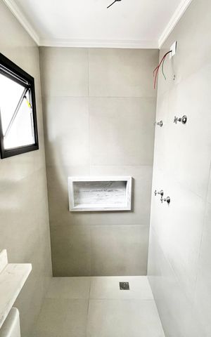 Casa à venda com 70m², 2 quartos e 2 vagas Casa à venda com 70m², 2 quartos e 2 vagasBanheiro da Suíte 1