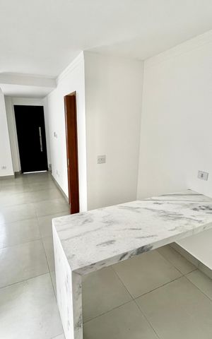 Casa à venda com 70m², 2 quartos e 2 vagas Casa à venda com 70m², 2 quartos e 2 vagasCozinha