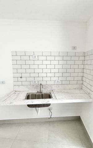Casa à venda com 70m², 2 quartos e 2 vagas Casa à venda com 70m², 2 quartos e 2 vagasCozinha
