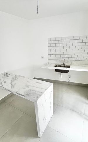 Casa à venda com 70m², 2 quartos e 2 vagas Casa à venda com 70m², 2 quartos e 2 vagasCozinha