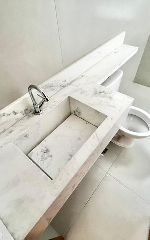 Casa à venda com 70m², 2 quartos e 2 vagas Casa à venda com 70m², 2 quartos e 2 vagasBanheiro da Suíte 1