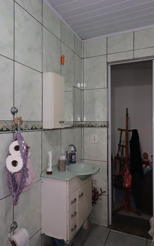 Casa à venda com 144m², 3 quartos e 2 vagasCasa dos Fundos - Banheiro