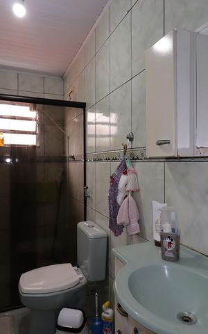 Casa à venda com 144m², 3 quartos e 2 vagasCasa dos Fundos - Banheiro