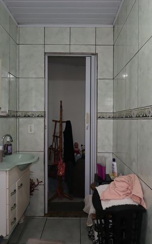 Casa à venda com 144m², 3 quartos e 2 vagasCasa dos Fundos - Banheiro