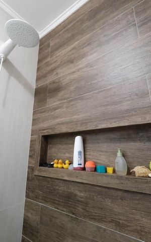 Casa de condomínio à venda com 103m², 2 quartos e 4 vagasSuíte 1