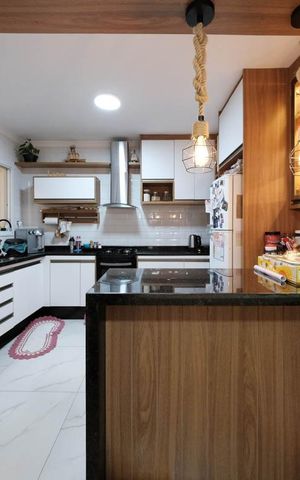 Casa de condomínio à venda com 103m², 2 quartos e 4 vagasSala/Cozinha