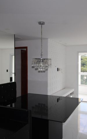 Apartamento à venda com 55m², 2 quartos e 2 vagasSala / Cozinha