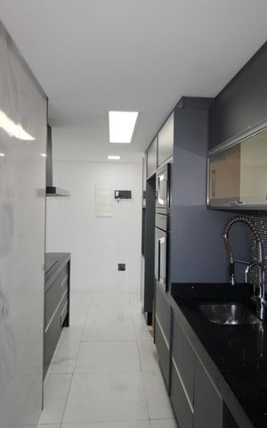 Apartamento à venda com 55m², 2 quartos e 2 vagasSala / Cozinha