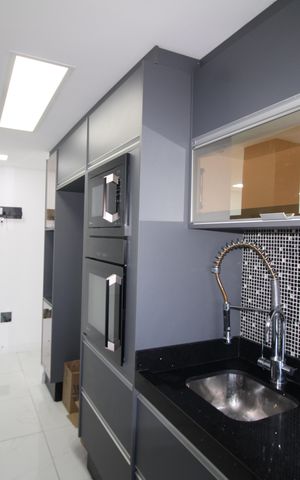 Apartamento à venda com 55m², 2 quartos e 2 vagasSala / Cozinha