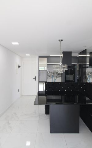 Apartamento à venda com 55m², 2 quartos e 2 vagasSala / Cozinha